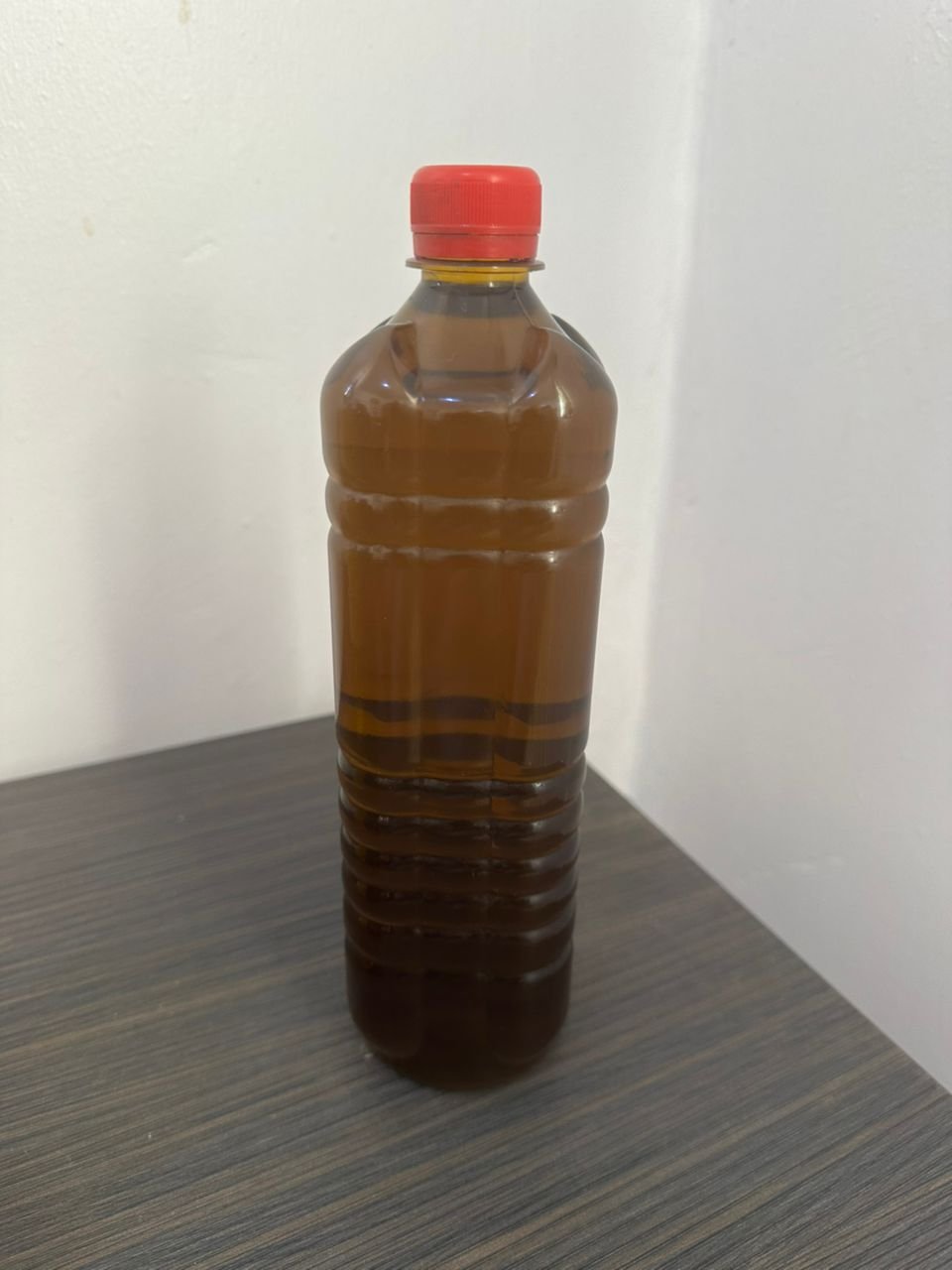 Hibiscus Oil in a plush rose-toned composition