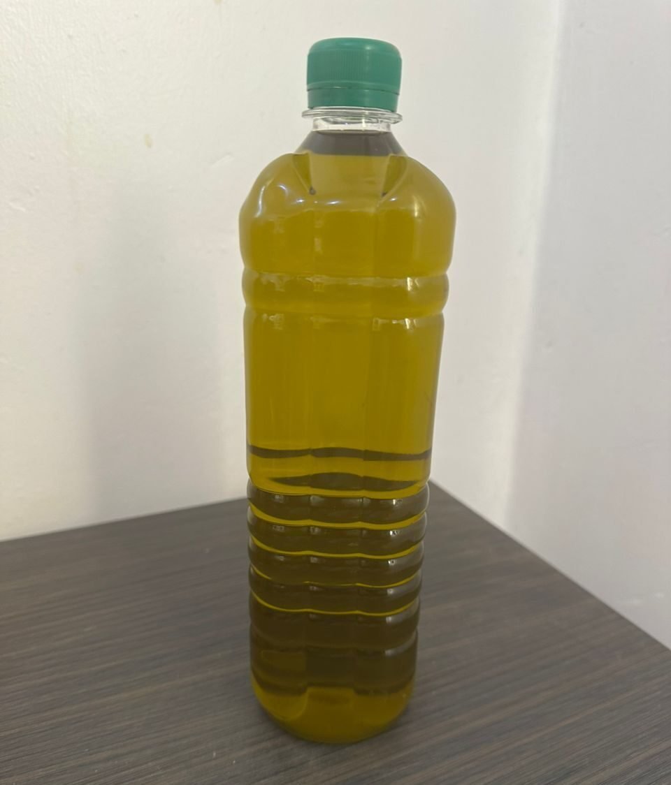 Baovita moringa oil bottle in an editorial composition for skincare, haircare, and body care applications